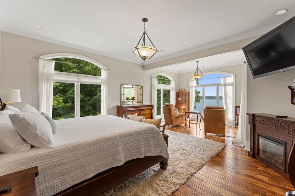 The primary bedroom with en suite bath&amp; sitting area with amazing views.