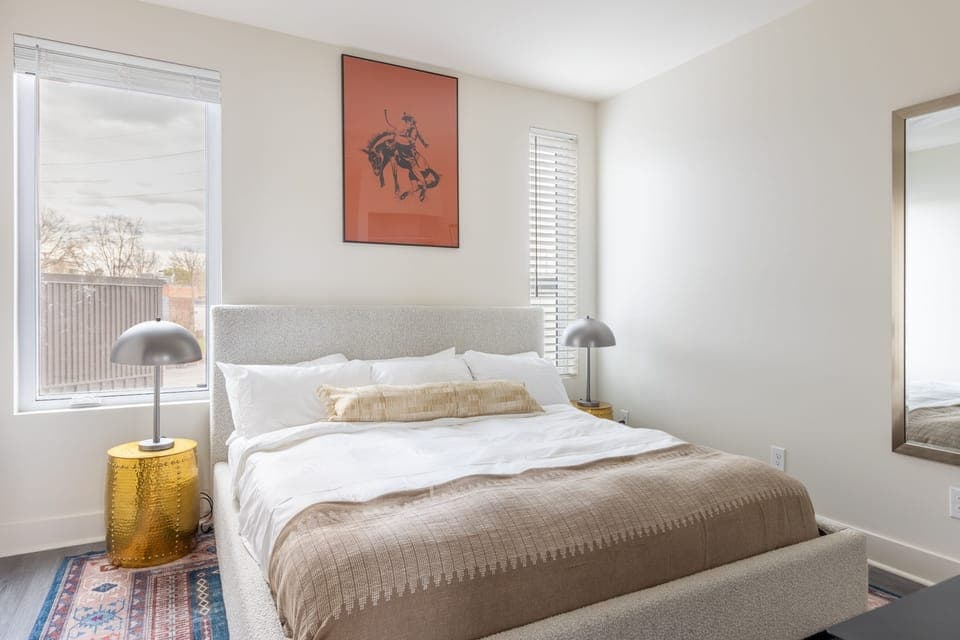 Four beautiful bedrooms, including one room with bunk beds.