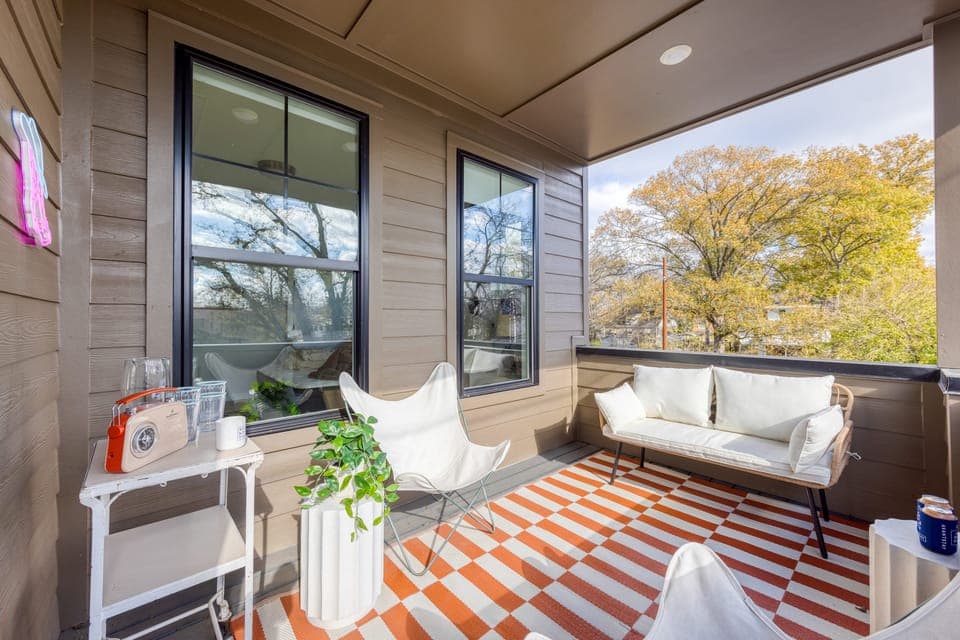 Outdoor living on the covered balcony. (The Stage)