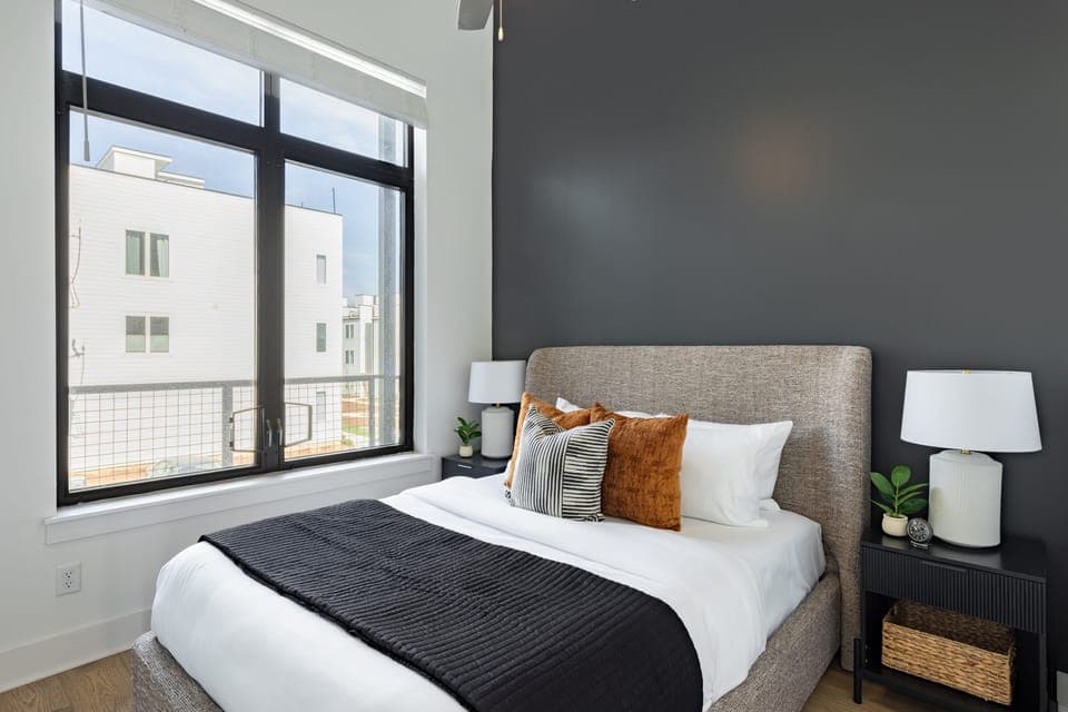 Bedroom 2 features a queen bed. (Unit 1)