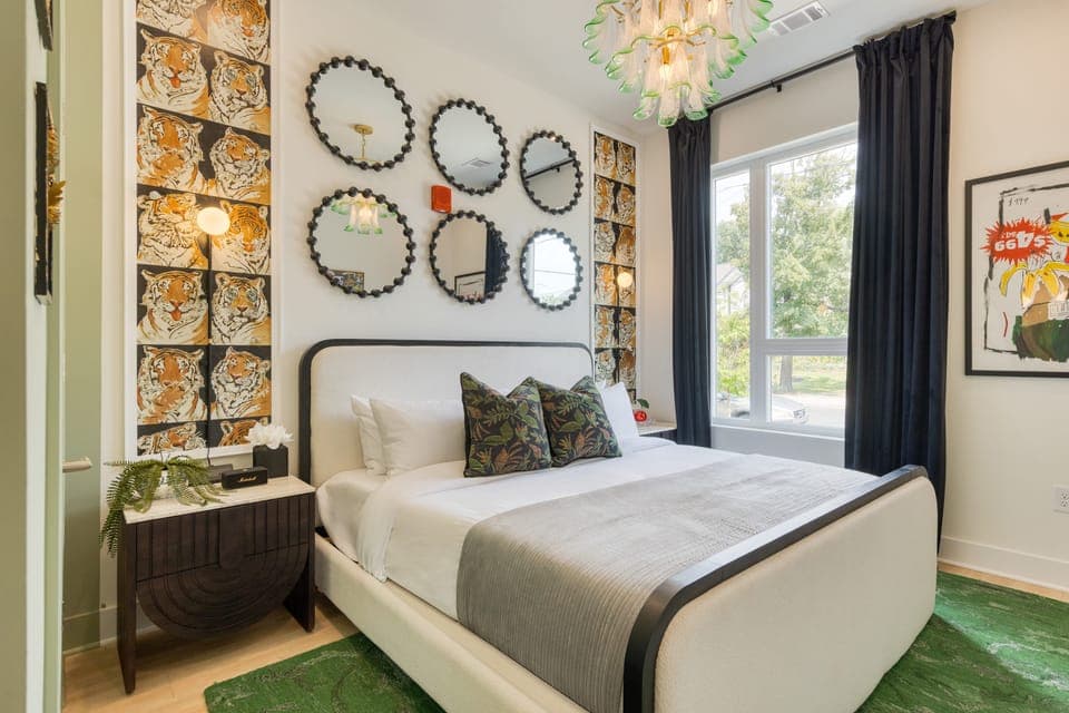The primary bedroom features a king bed and an ensuite bathroom.