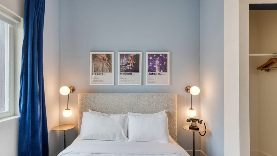 Bedroom 3 features a queen bed and ensuite access. (A101)