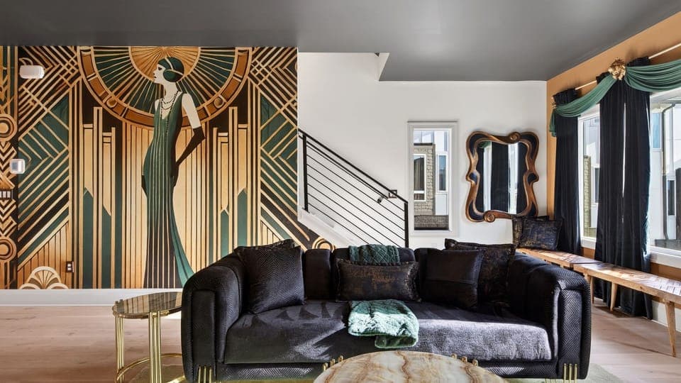 Stylish living room with plush seating, statement chandelier, and open-concept layout. (The Great Gatsby)