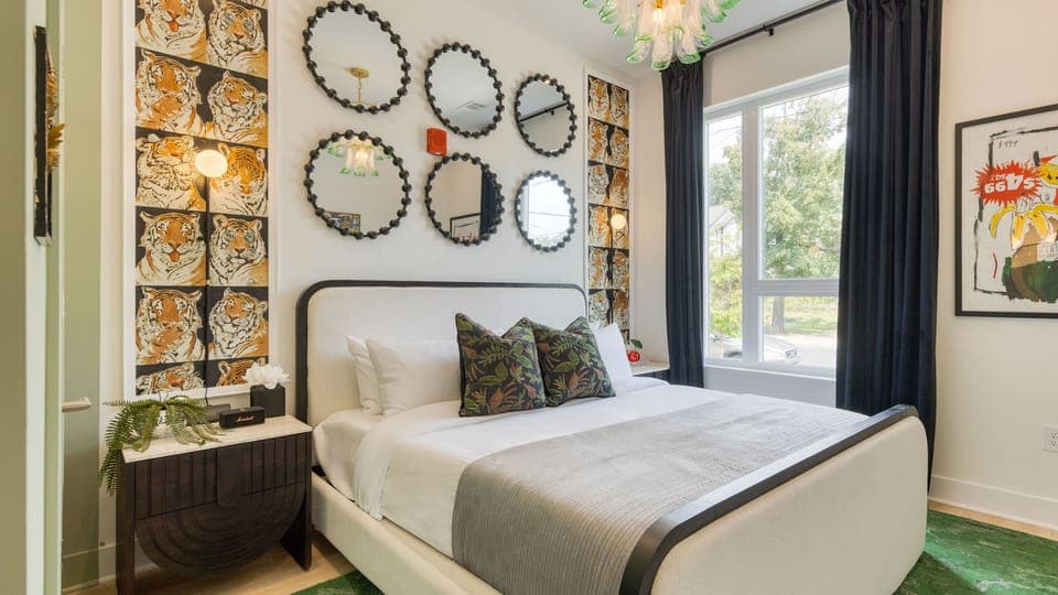 Unit 101: The primary bedroom features a king bed and an ensuite bathroom.