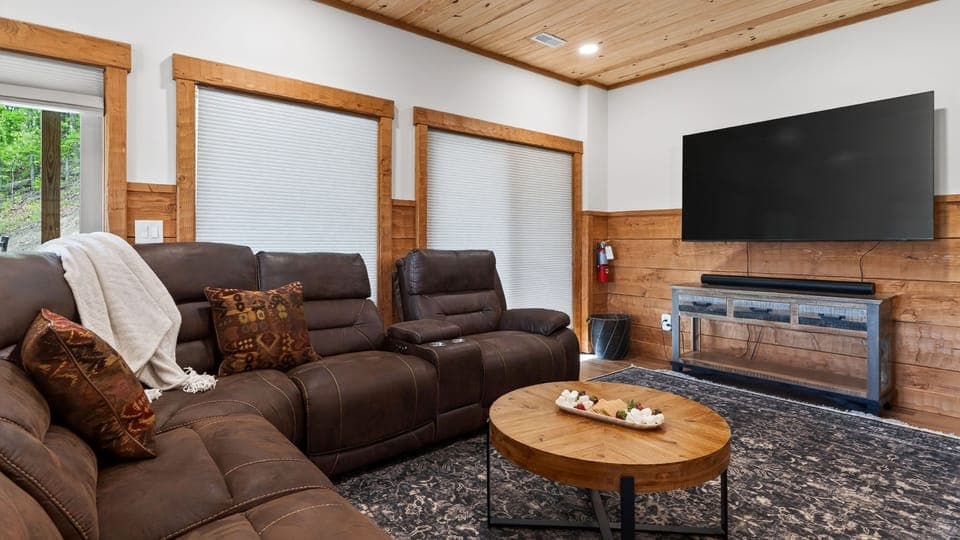 Plush leather reclining sofas and a large flat-screen for the ultimate movie night.