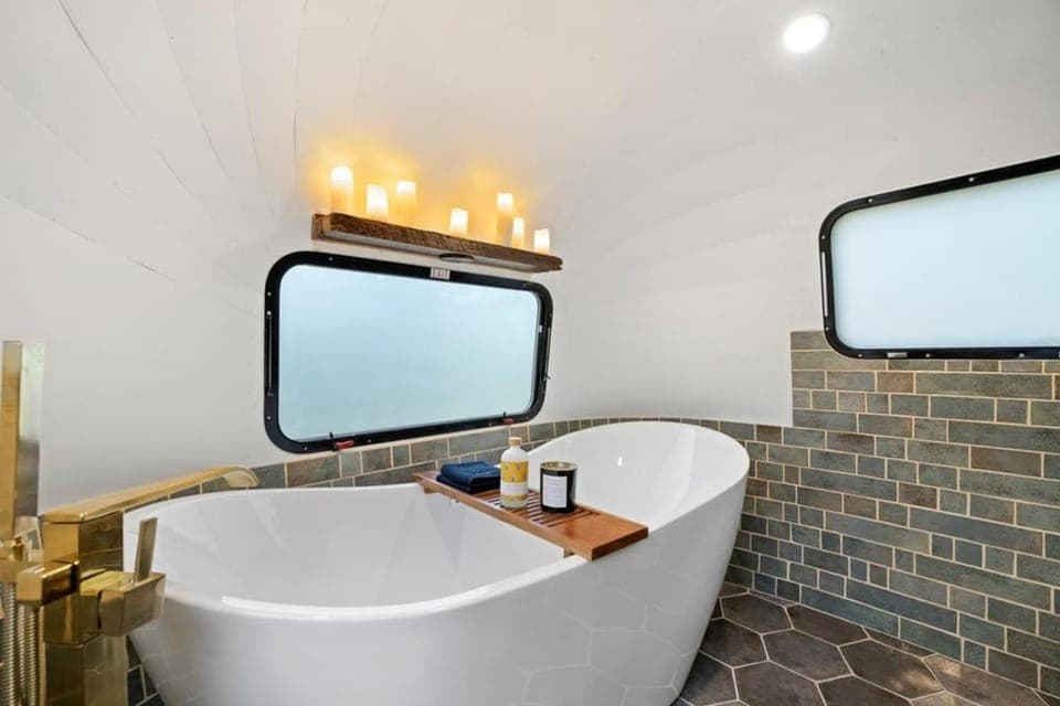 Airstream w Bathtub, River, & Hot Tub House in Pisgah Forest