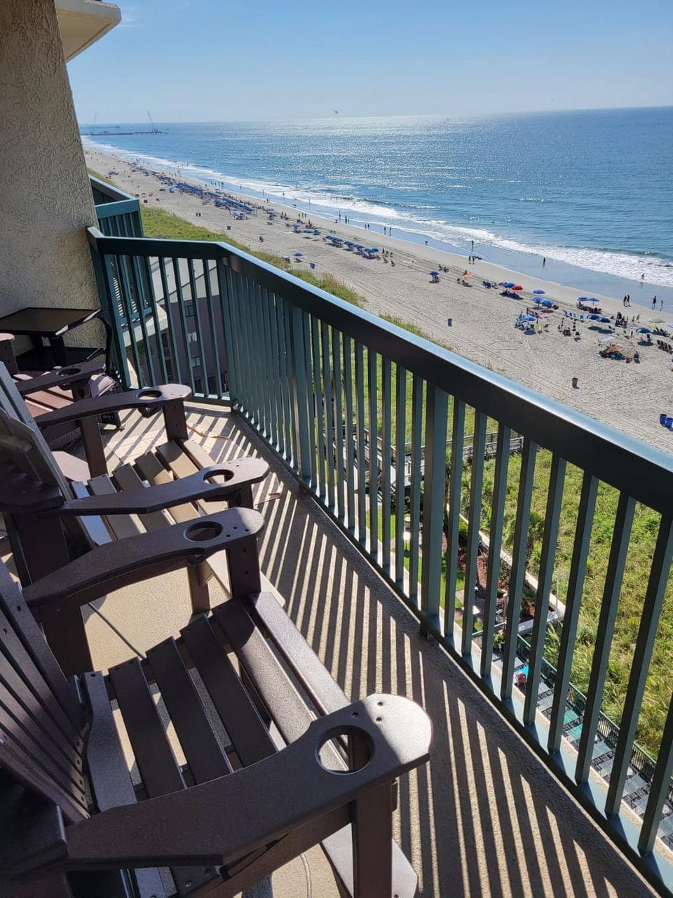 Property building, Patio, Seating area, Beach, Sea view