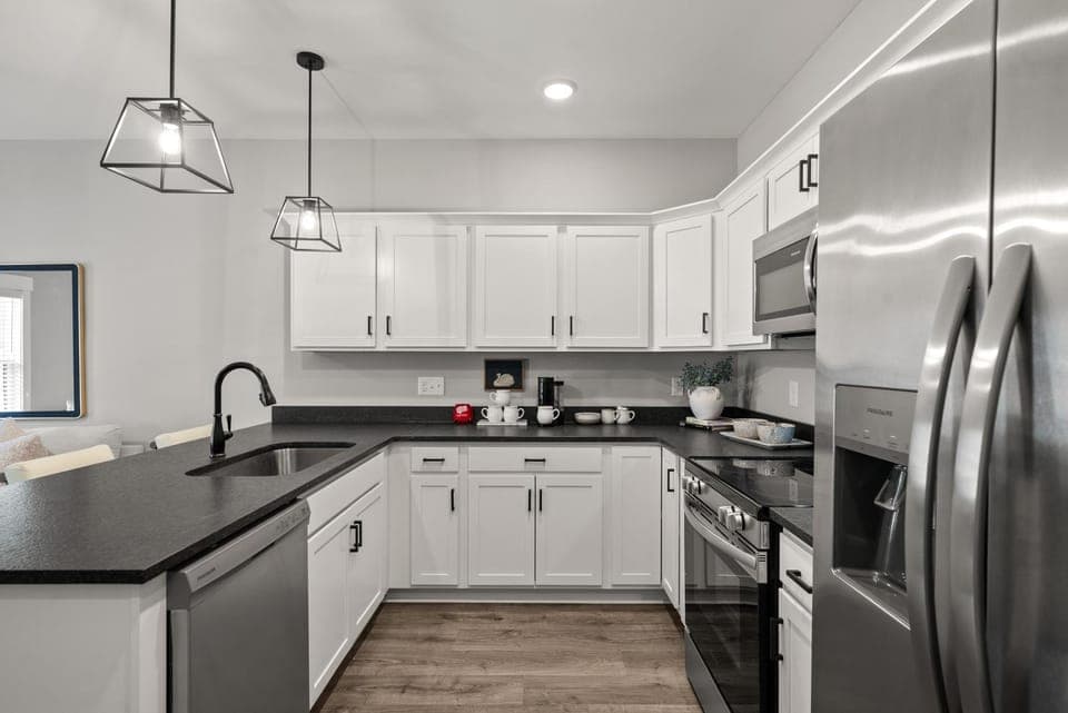 Kitchen or kitchenette, dishwasher, oven, stove, toaster