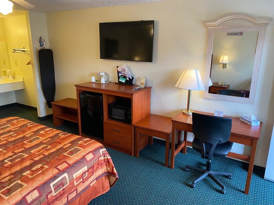 Bed, Bedroom, fireplace, furniture, heating, minibar, wardrobe, air conditioner