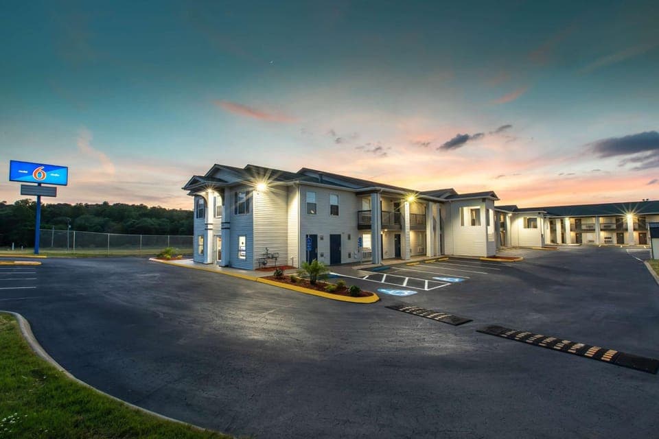 Property building, Facade/entrance, Property logo or sign, On site, Time of day, Sunset