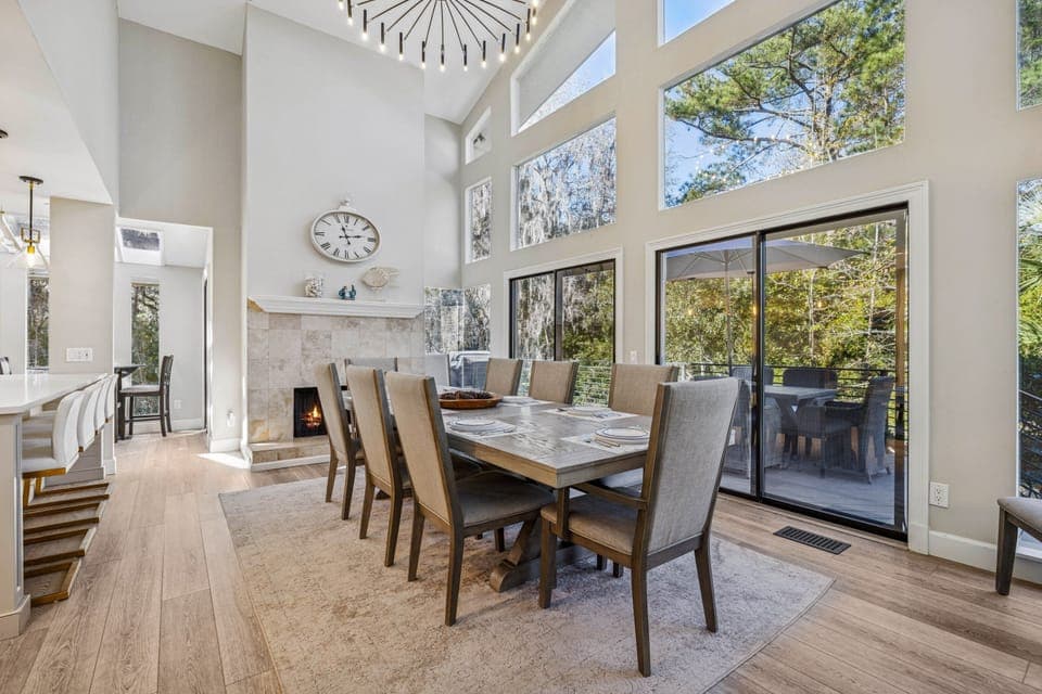 Dine overlooking the deck and Lowcountry greenery