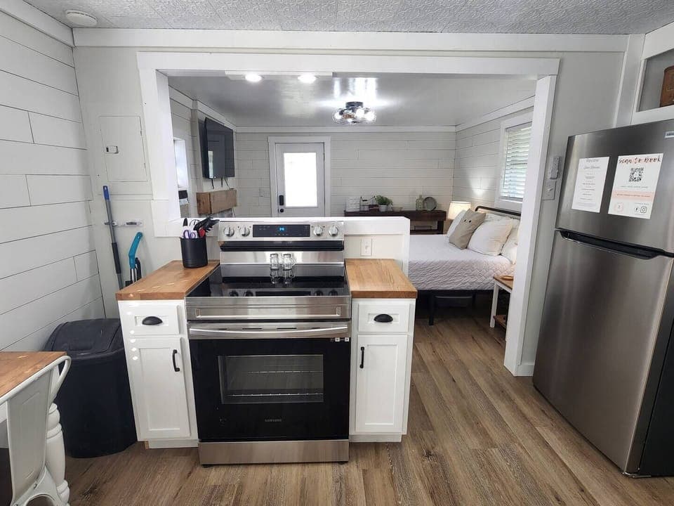 Full size stove and a few pots and pans provided