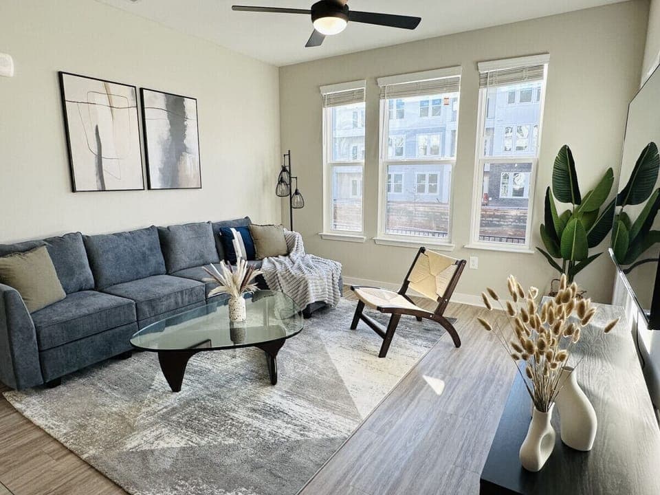 Welcome to our cozy retreat in the heart of Athens, GA! Unwind in our stylish living room after a long day out and about.
