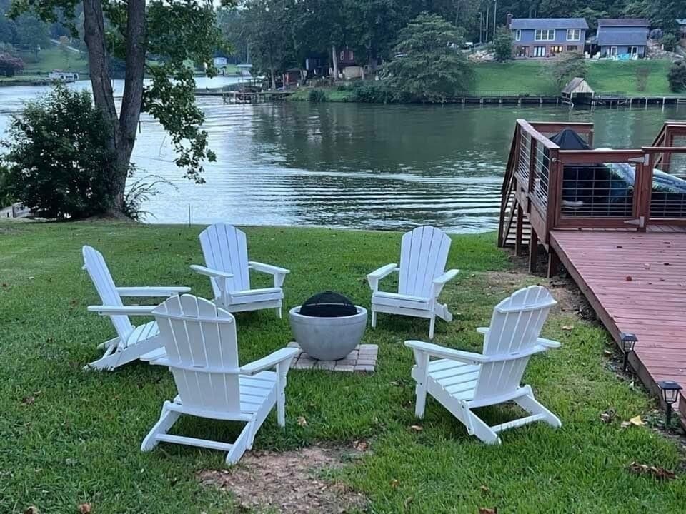 Gather around the fire pit for a relaxing evening near the water.