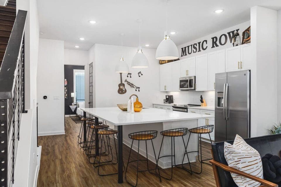 Massive kitchen island with seating for 8. We provide all the kitchen essentials, cleaning supplies, and utensils so you can cook & make yourself at home.