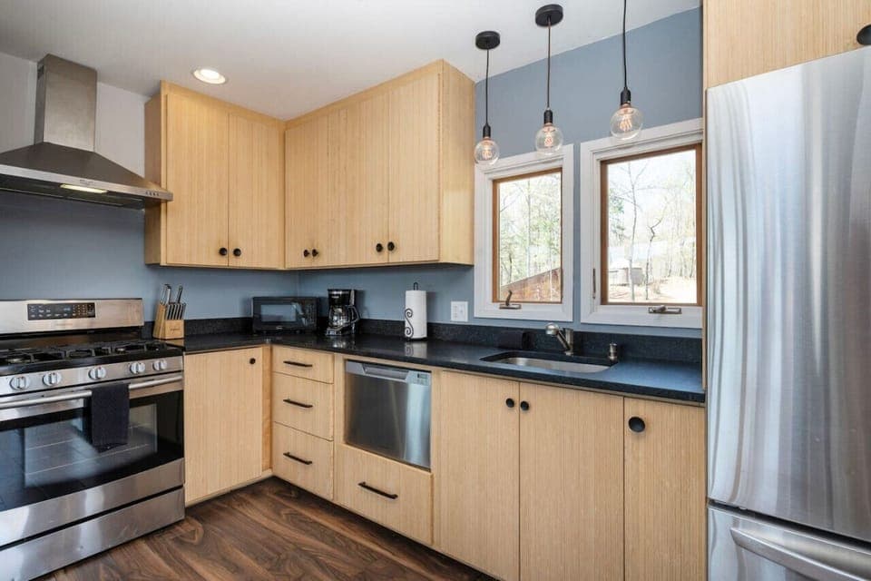Full kitchen including all dishes, pots, pans, and coffee supplies