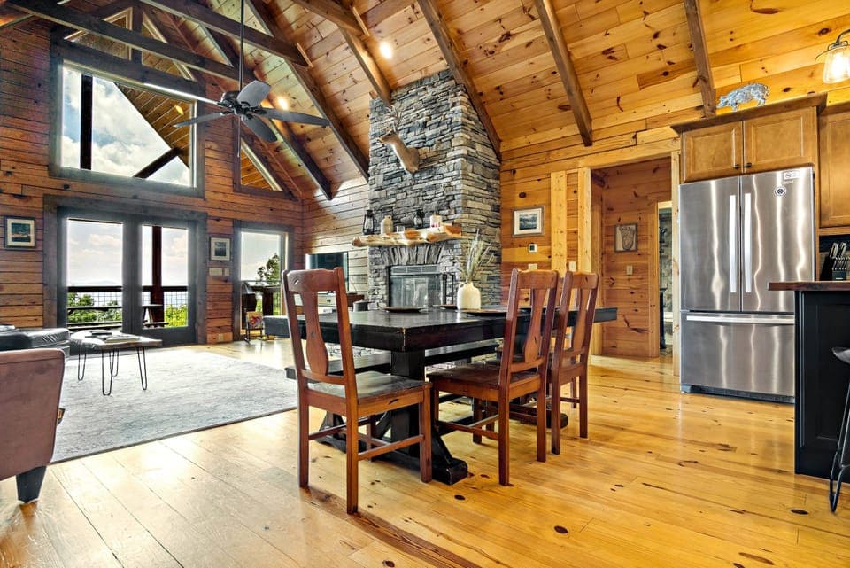Open kitchen, dining, and living areas.