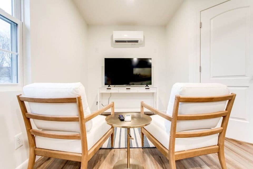There is also a smart T.V. and sitting area in the bedroom.