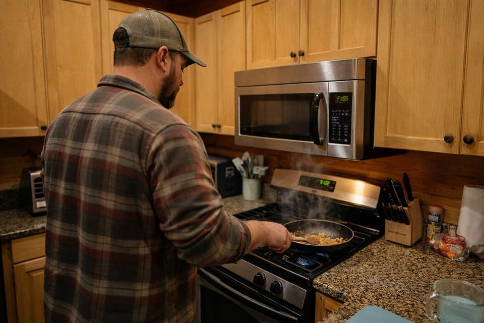 Warm wood, steady heat, and supper comin’ together slow. Just the way mountain kitchens do it.