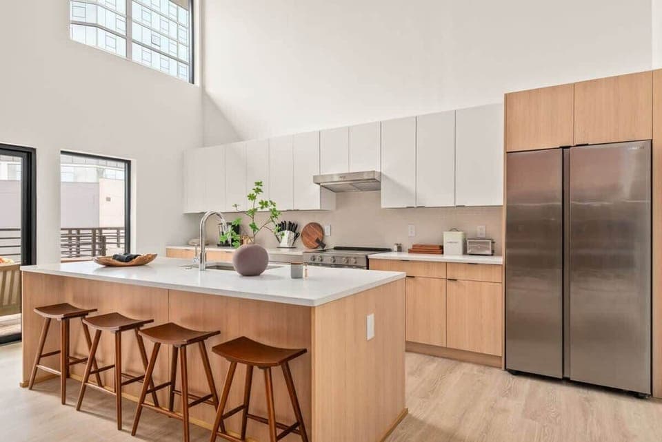 Fully equipped kitchen with island. We provide coffee, tea, sugar, salt, pepper, olive oil and balsamic vinegar