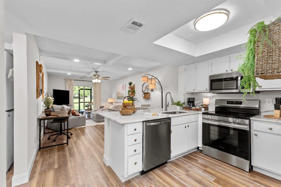 open-concept kitchen, dining, and living space 
