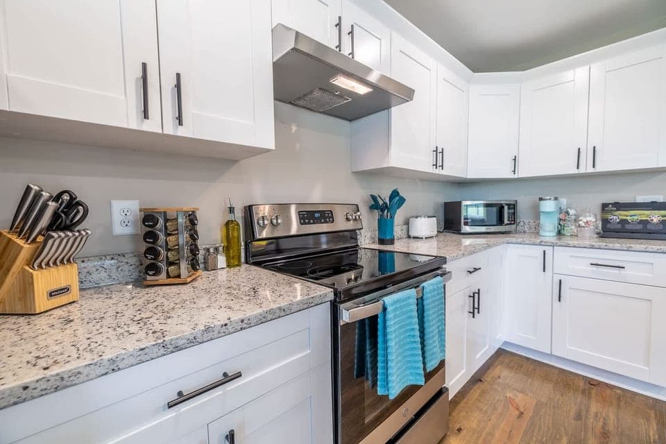 The charm of our Open Kitchen, a beautifully designed space that combines functionality with style.