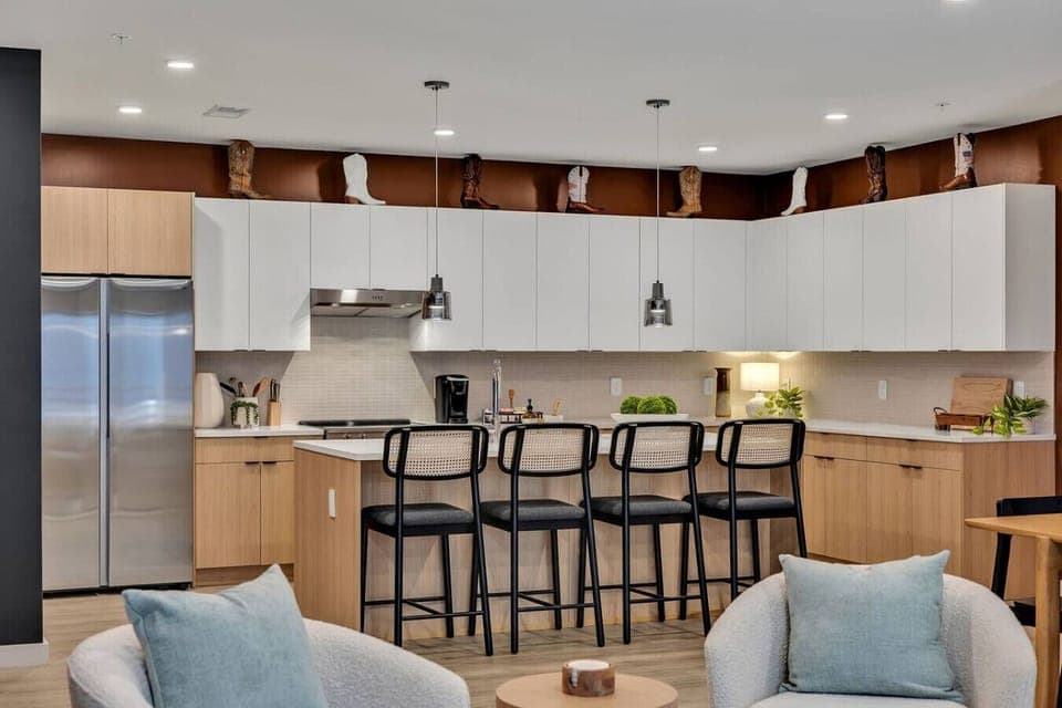 Fully stocked kitchen with stainless steel appliances and everything you`d need to make a home cooked meal