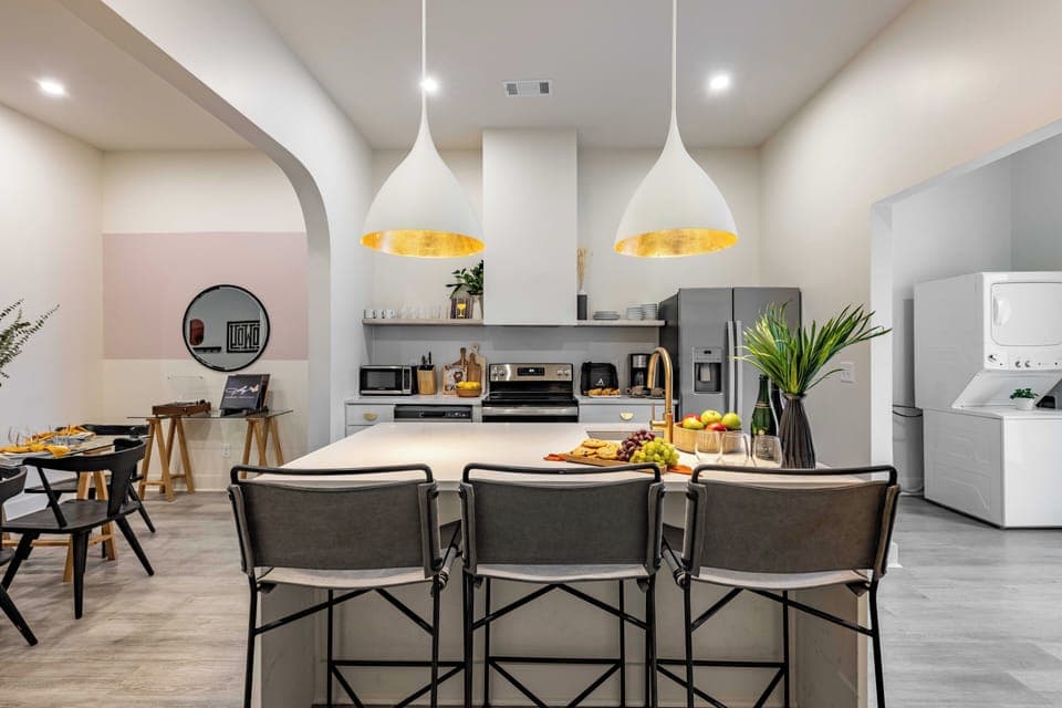 Barstool seating at the kitchen island.