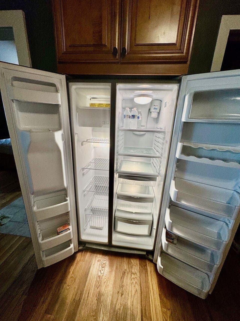 Large fridge with ice maker, and filtered water.