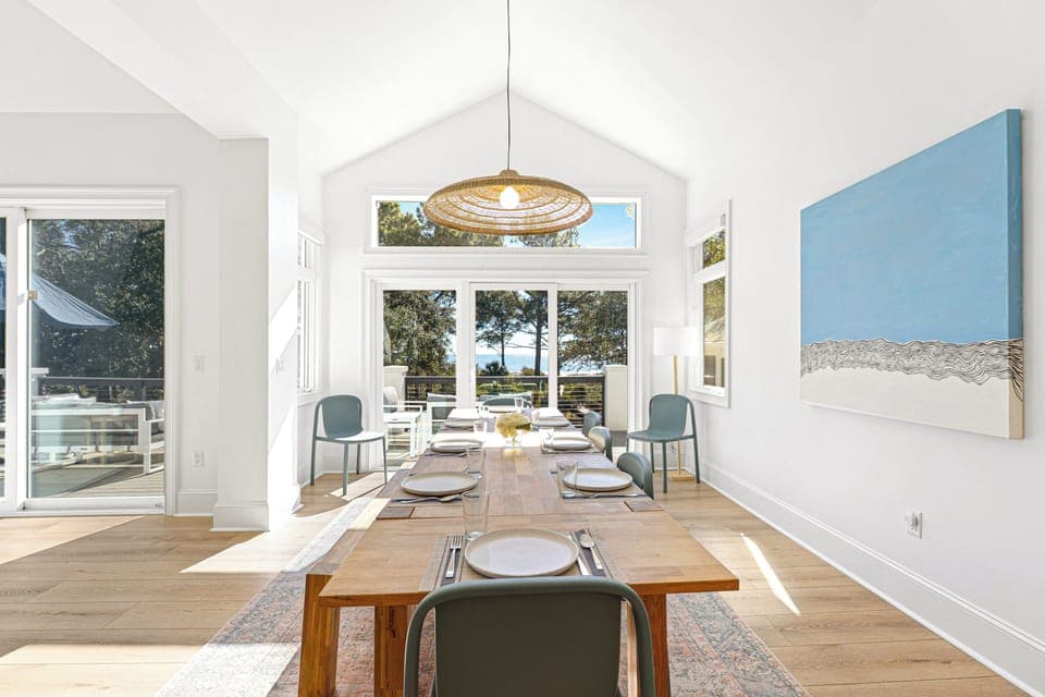 Kitchen and Dining:  Dining table seats 8, Breakfast table seats 3, Island bar with a seating for 8