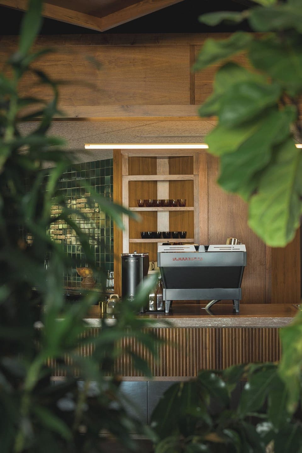 Sip a crafted espresso in a lush, design-forward bar.