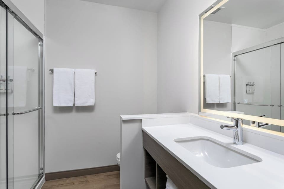 Combined shower/tub, hair dryer, towels, toilet paper