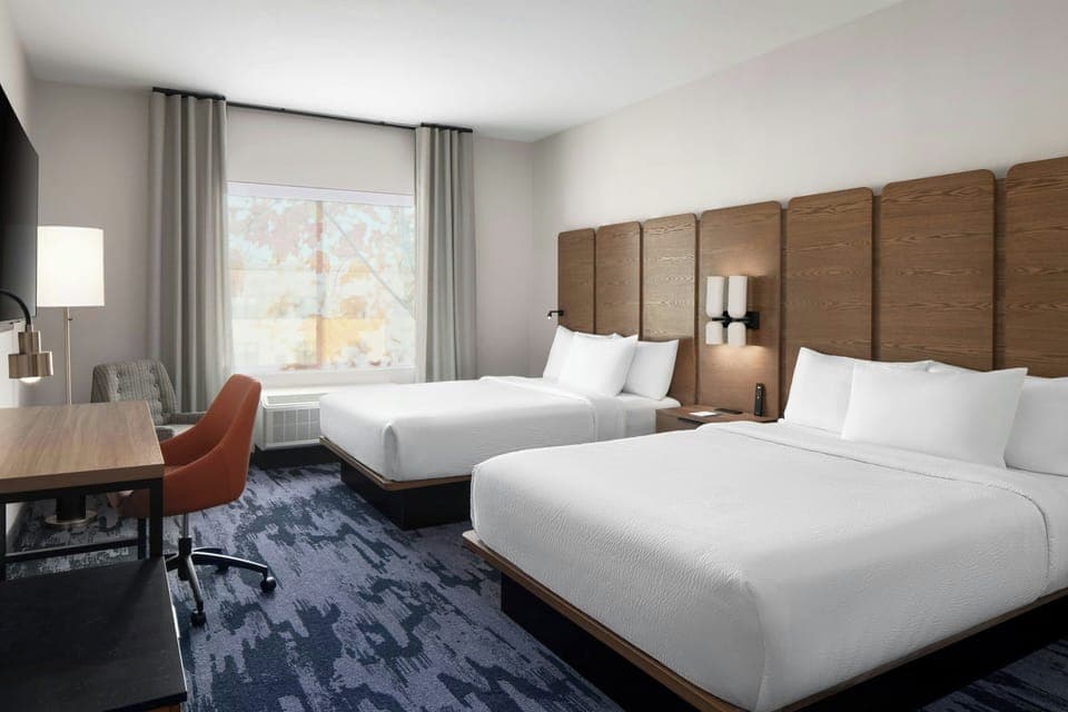Desk, laptop workspace, free WiFi, bed sheets