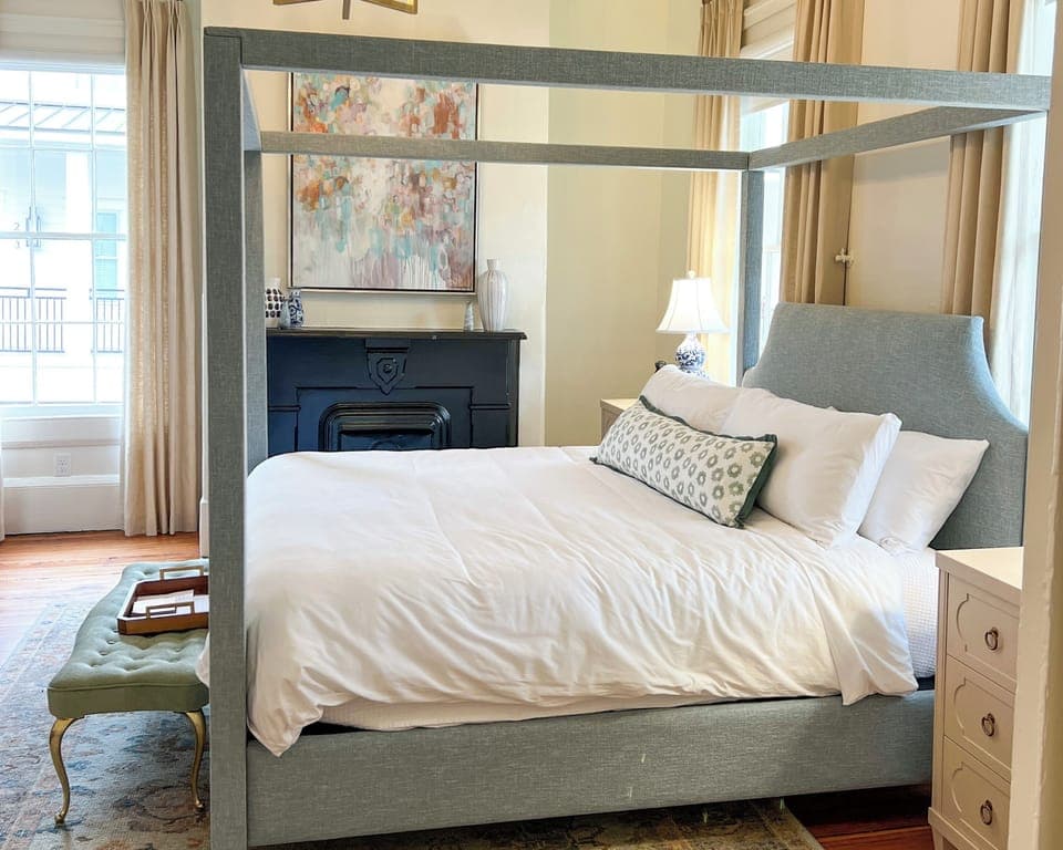 The Iris Suite with king size bed and ensuite bathroom with walk in shower