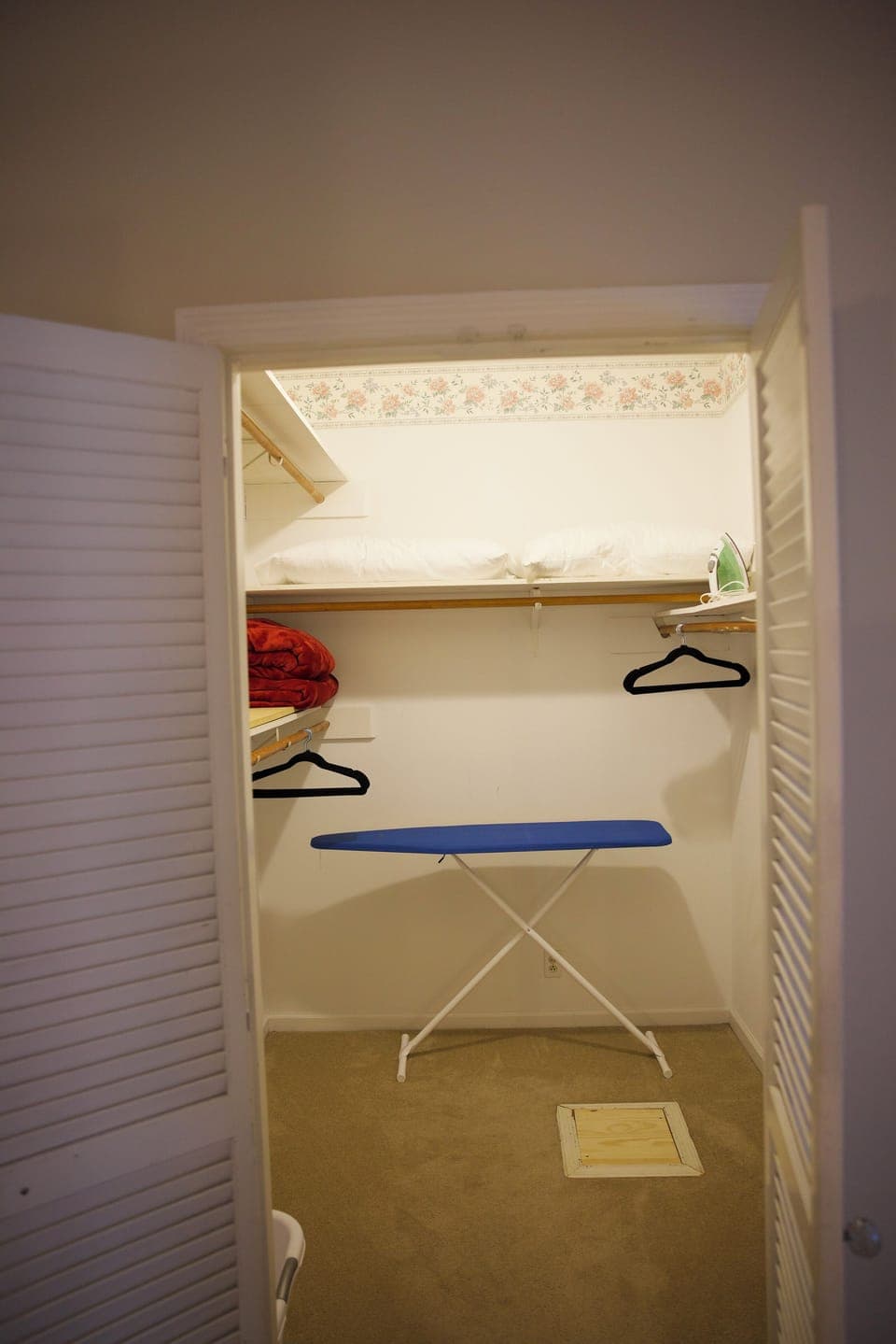 Primary bedroom walk in closet.