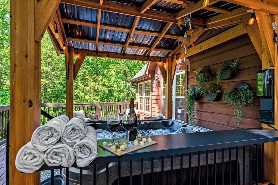 Imagine unwinding with a nice glass of wine after a long hike, soaking in the gorgeous surroundings in this brand new hot tub in Townsend, TN.