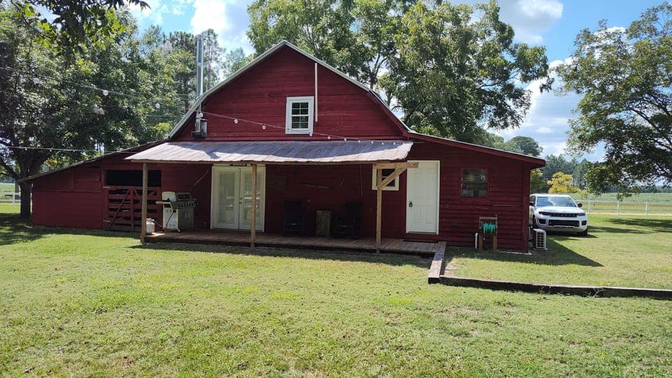 Relax on the porch with your morning coffee that overlooks the horse pasture
