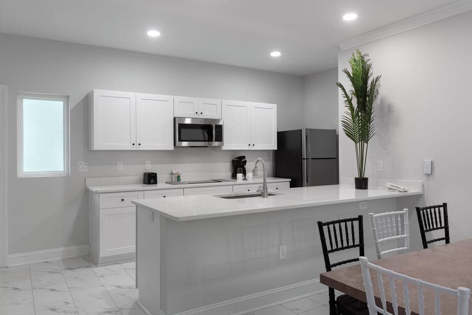 Condo, 3 Bedrooms | Private kitchen | Fridge, microwave, stovetop, dishwasher