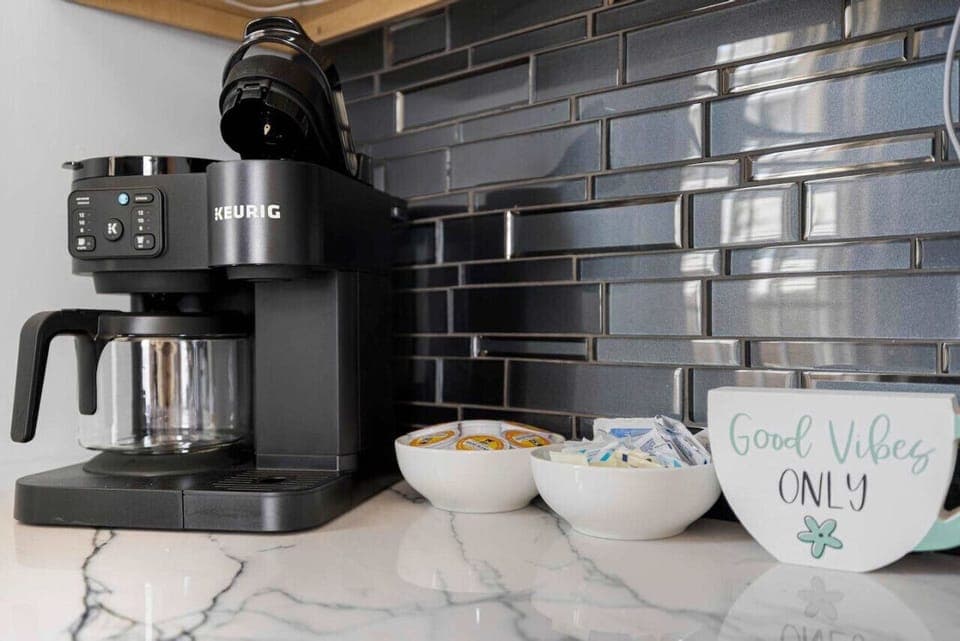 Start your day right in this charming coffee space, the perfect nook to brew your favorite cup and unwind.