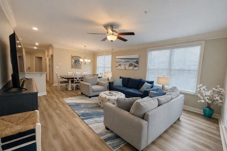 Plenty of seating with one sofa that converts into a queen sleeper. 65" Smart TV