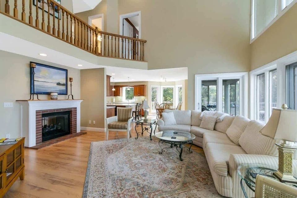 Comfortable seating and natural light make this living area perfect for gathering.