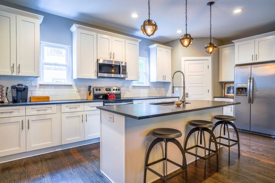 Modern kitchen with toaster, Keurig coffee maker, blender, and more