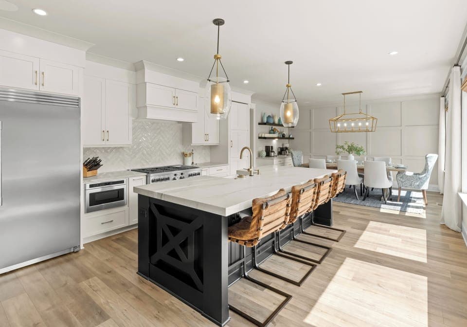 Fully stocked, large updated kitchen with island seating for 4. 