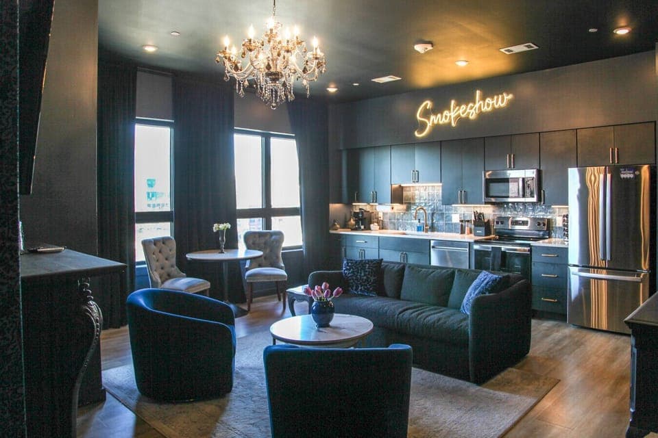 The Smokeshow Living Room with sofa bed, fireplace, Smart TV, and more