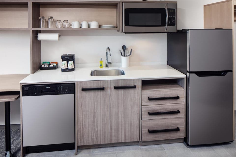 Desk, laptop workspace, blackout drapes, iron/ironing board