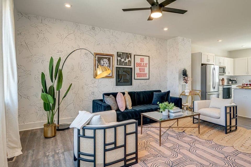 5629 - Bright and open living space complete with designer furnishings and smart TV.