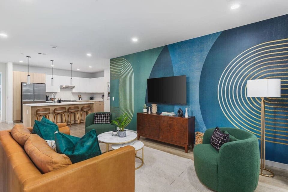 Bright and spacious living room off the kitchen. Smart TV, and pull-out sleeper sofa for ultimate comfort.