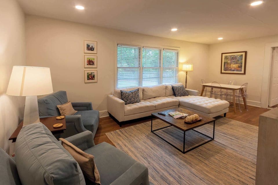 Cozy and spacious living area with TV