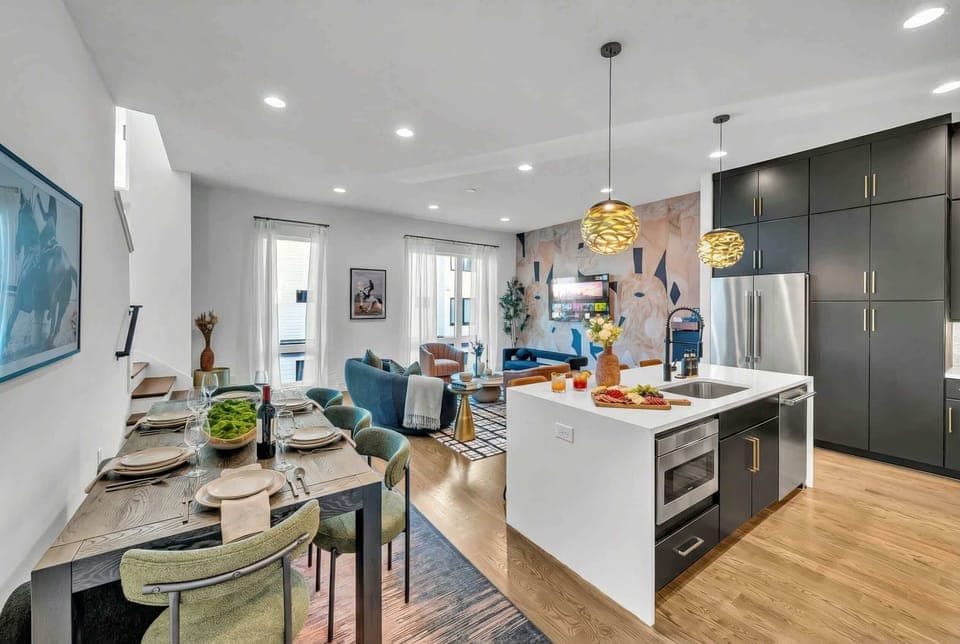 Discover a stylish retreat in downtown Nashville! This chic vacation rental boasts a spacious layout with luxury finishes, perfect for large groups. Relax in the plush living area or gather around the dining table. Your unforgettable getaway awaits!