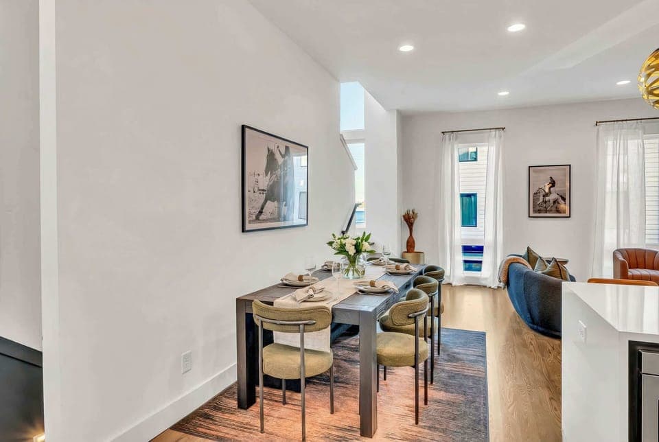 Gather your crew for an unforgettable stay in this chic Nashville getaway! Enjoy upscale comfort, elegant decor, and vibrant city views in a stylish dining area perfect for family reunions or bachelorette parties.